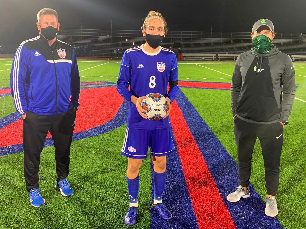 Conner Osterholt '21 broke the single season goal scoring record for Carroll Boys' Soccer with previous record holder Alex Van Der Sluijs in attendance.