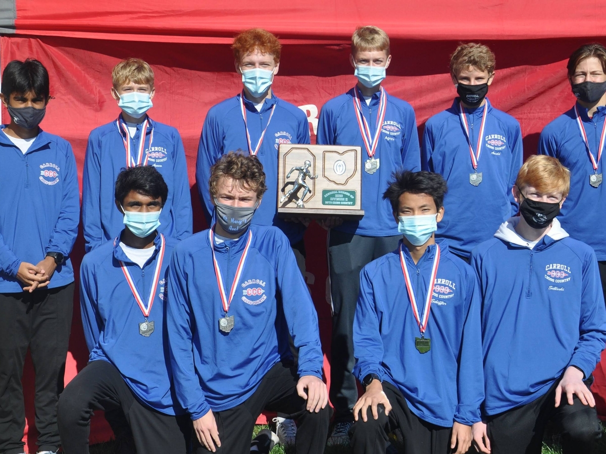 Boys' Cross Country celebrates a second place finish at the Ohio High School Athletic Association D-II Regional Championships