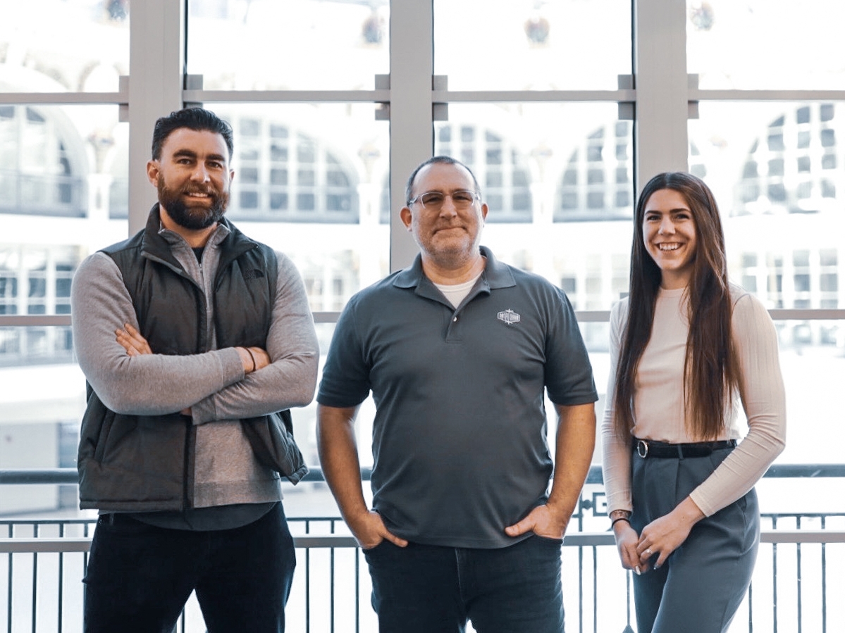 Alek Mezera '04, Dave Mezera '81, and Natalie Mezera '14 of DataYard at the Dayton Arcade Innovation Hub.  Photo by @tayloredsocial/Taylor Hudson Snead