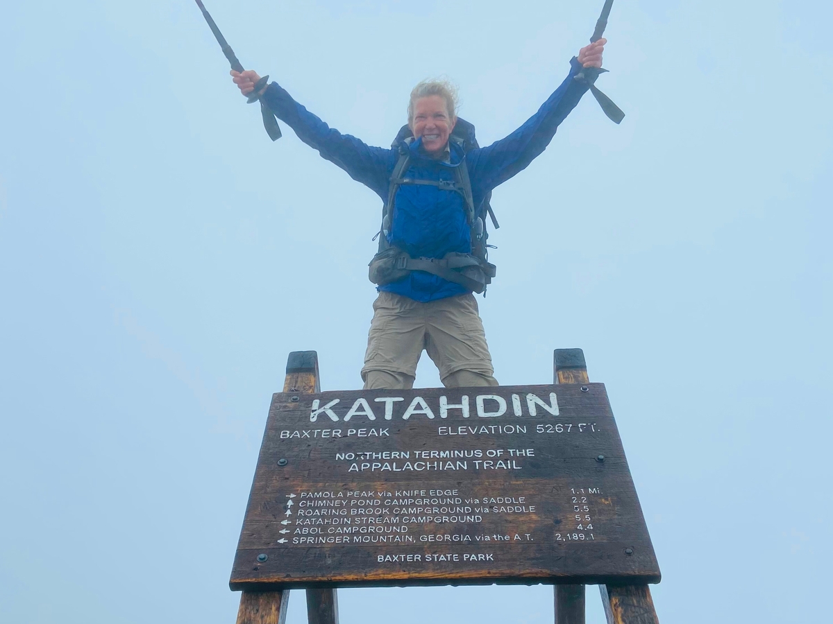 Jean (Geiger) Bussell '74 at Katahdin after finishing a thru-hike of the Appalachian Trail